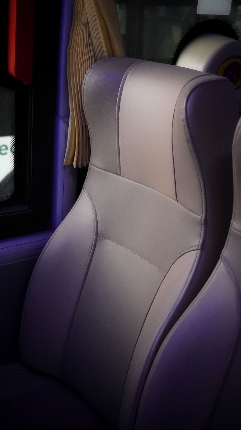 Close view of a premium upholstered passenger seat